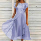 Abito elegante da donna con scollo rotondo