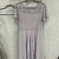 Abito elegante da donna con scollo rotondo